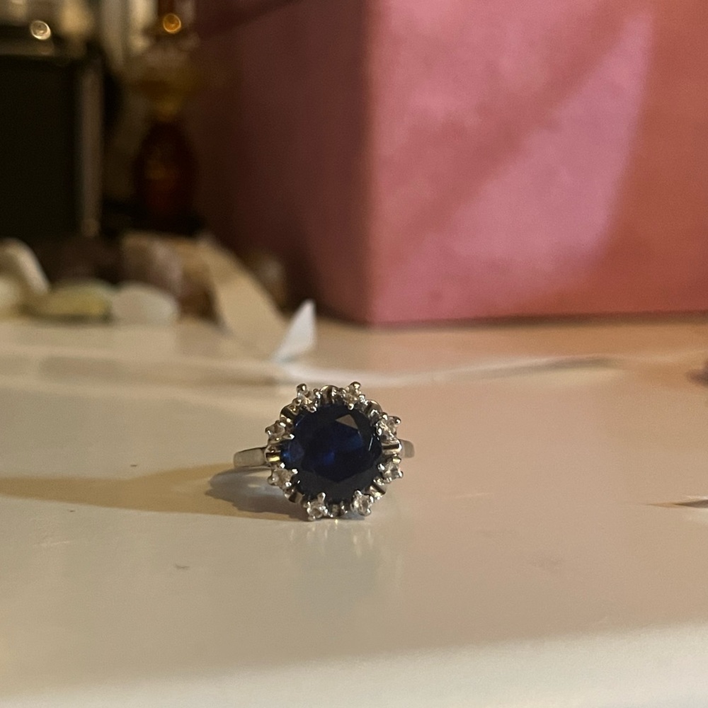 Vintage 10k ring with a big blue sapphire with tiny diamonds